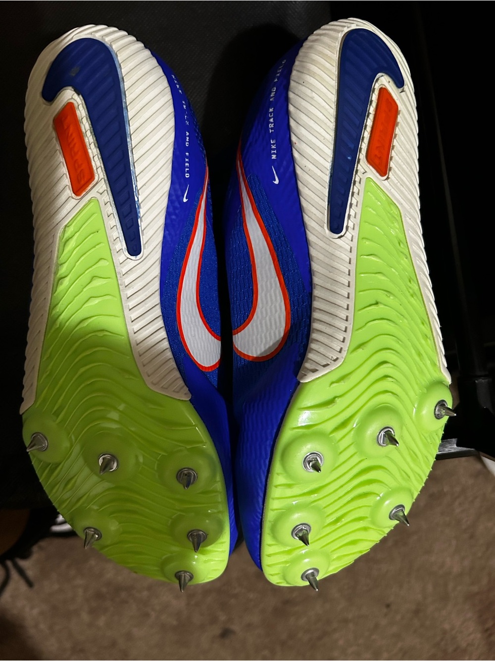 Nike Kids Blue Soccer Sneakers with Silver Swoosh and Orange Accents